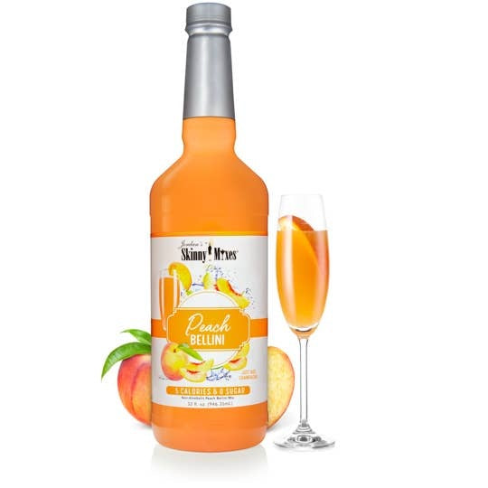 32 fl oz plastic bottle of peach-flavored sugar-free mixer in a clear container.