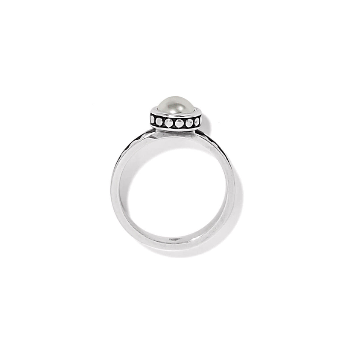 Silver plated ring with a quarter-inch wide glass pearl cabochon set in Balinese silver style.