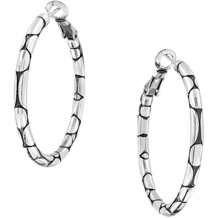 Silver plated small hoop earrings featuring a pebble texture with post lever backs.