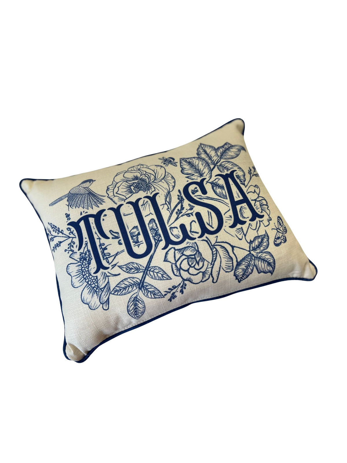 Rectangular cream pillow with blue piping and Victorian floral design featuring the name TULSA.