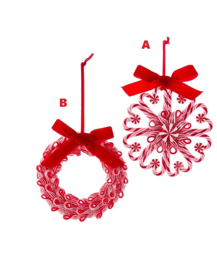 Red claydough peppermint wreath ornament with white glitter candy pattern and red bow.