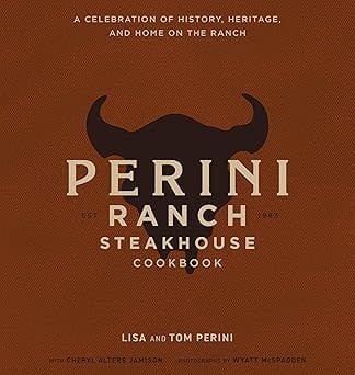 Hardcover cookbook titled Perini Ranch Steakhouse Cookbook featuring a rustic Texas-themed cover.
