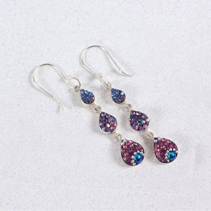 Sterling silver petite cascade earrings featuring dangling Austrian crystals in a delicate V-shaped silhouette.