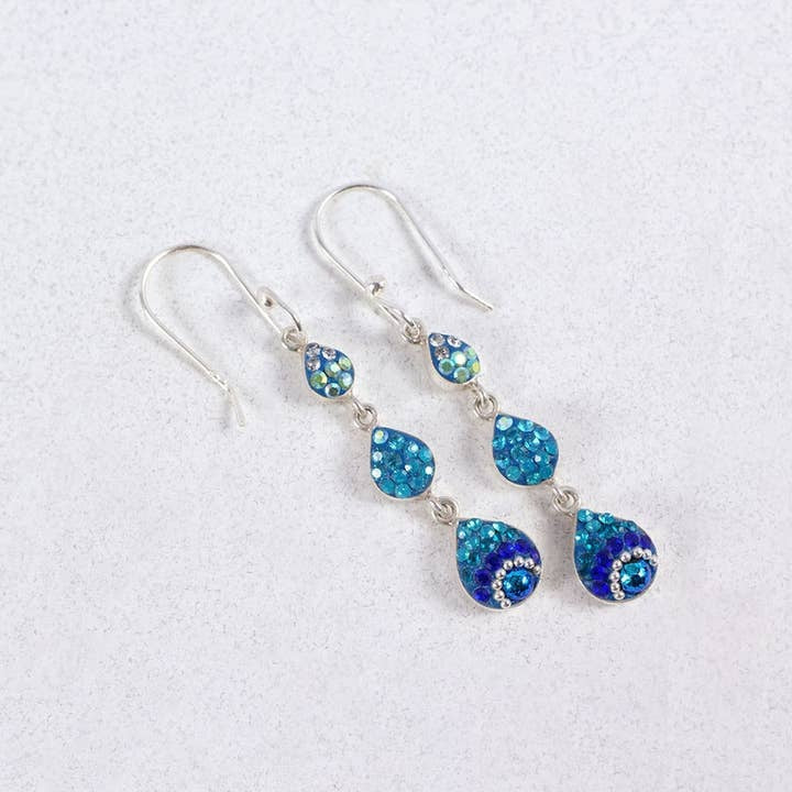 Sterling silver petite cascade earrings featuring dangling Austrian crystals in a delicate drop silhouette.