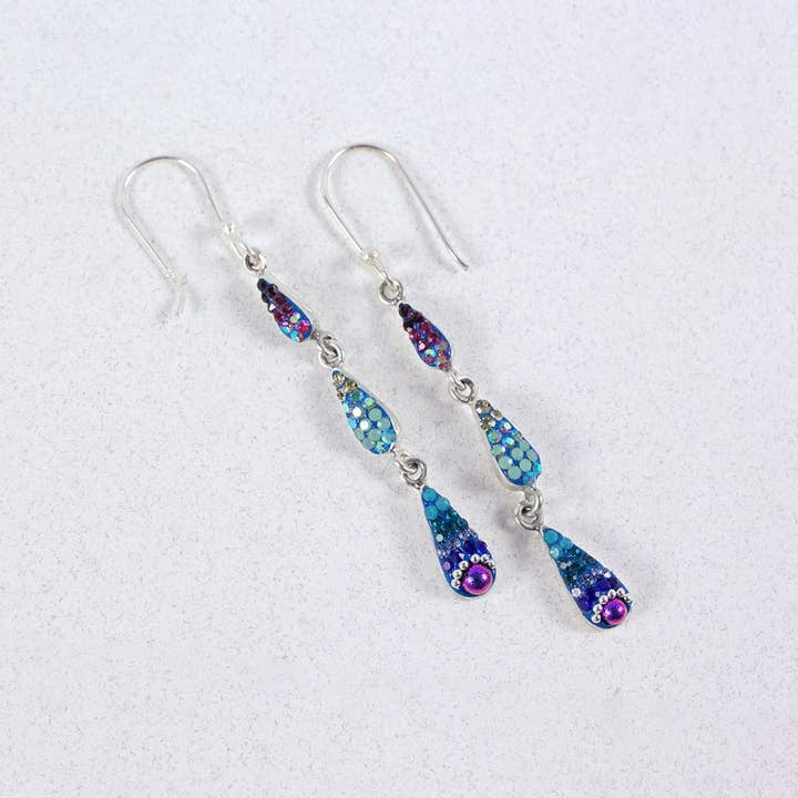 Sterling silver petite trickle earrings featuring a cascading pattern of Austrian crystals in clear and iridescent tones.