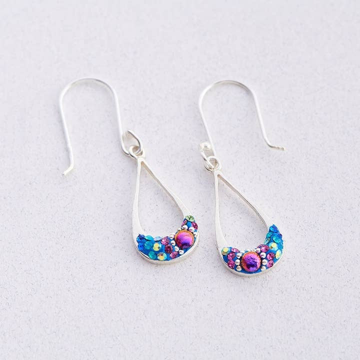 Sterling silver petite long drop hoop earrings featuring Austrian crystals in a sparkling pattern.