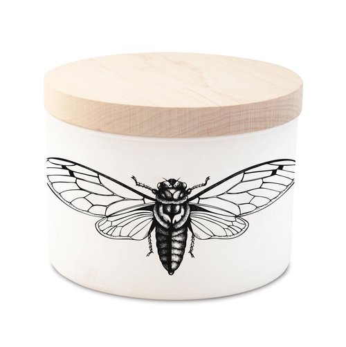 Matte white vessel candle with maple wood lid featuring a silk-screened graphic citronella triple wick design.