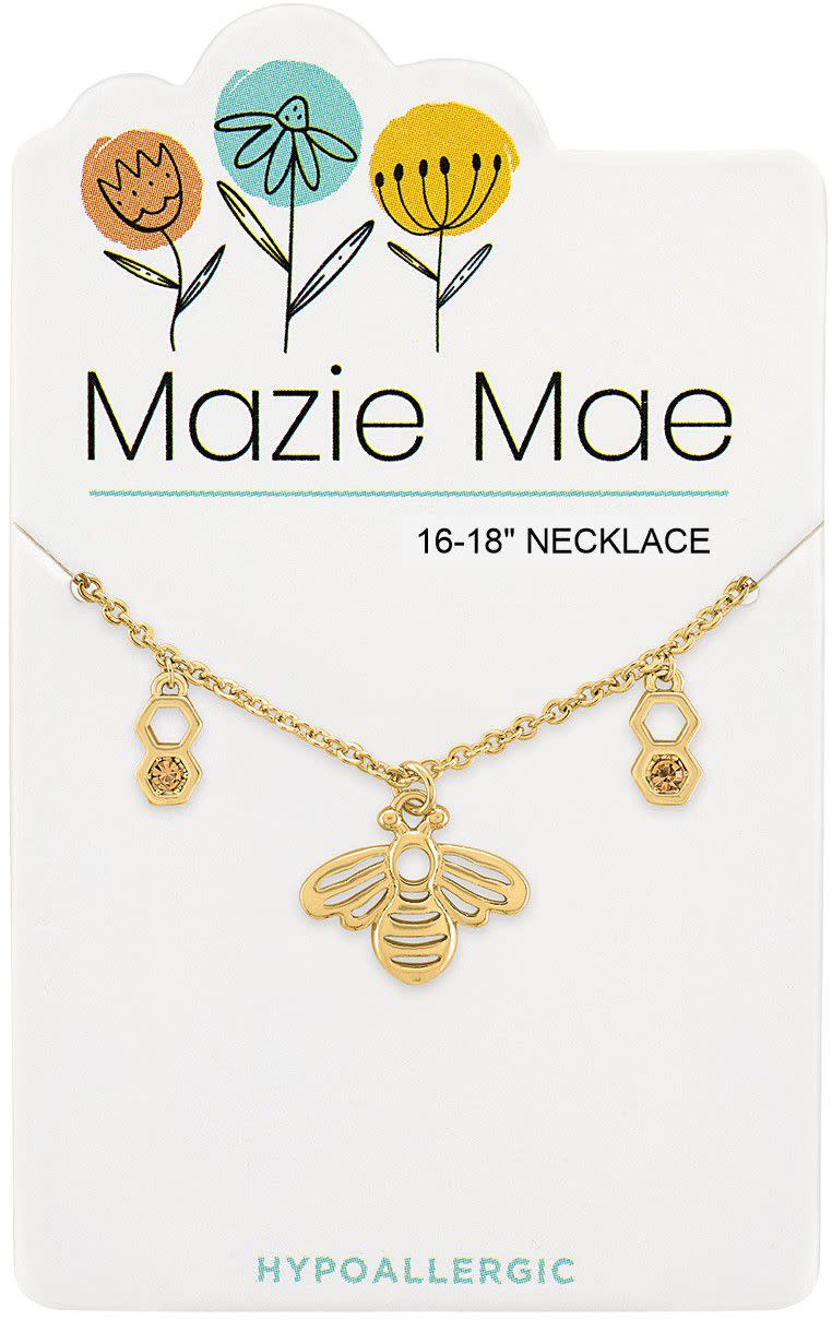 Gold Mazie Mae necklace featuring a delicate chain with an oval pendant.