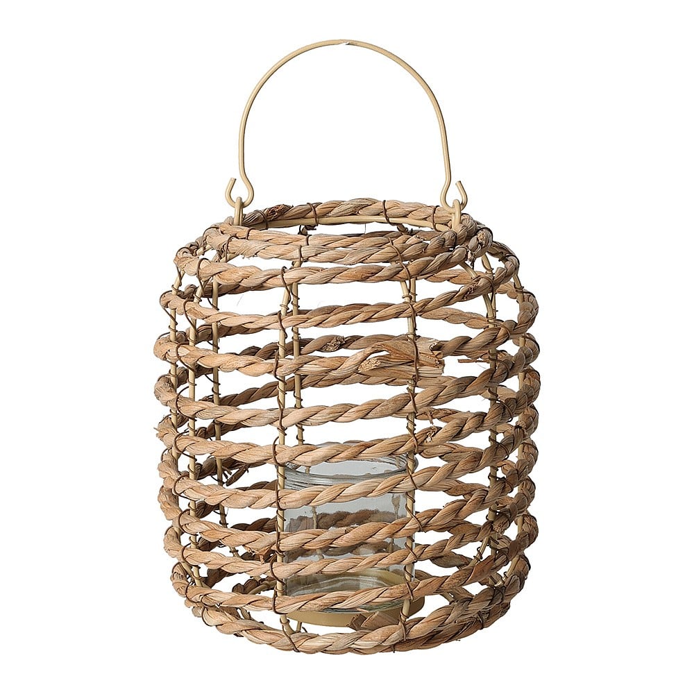 Hand-woven natural cattail leaf lantern with metal frame holding a candle inside.