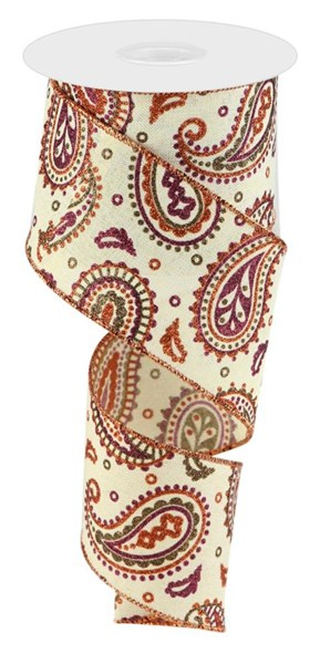 2.5 inch wide cream royal ribbon with a glittery orange and purple paisley pattern on a spool.