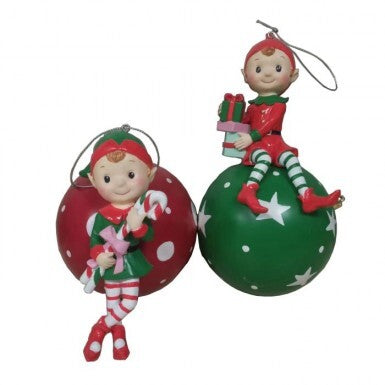 Eight-inch resin elf figurine holding a decorative ornament