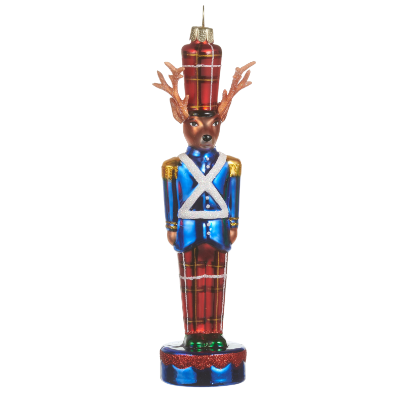 6.5-inch glass deer nutcracker ornament in a blue uniform and red plaid trousers.
