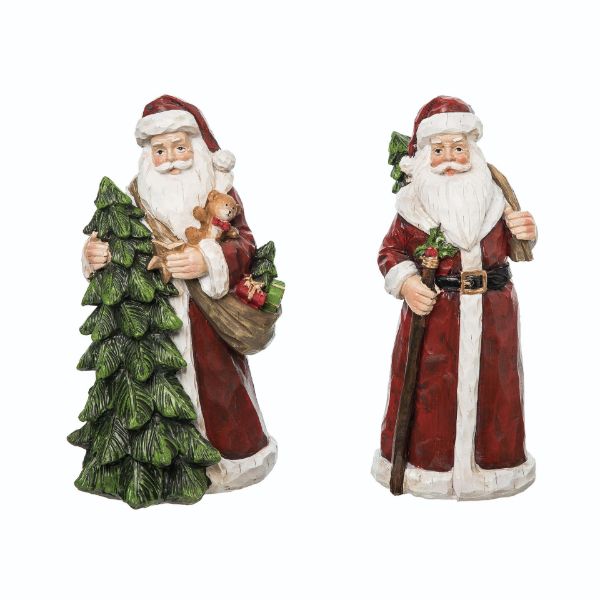 Resin carved Santa figurine in red suit with white beard standing on a green base.