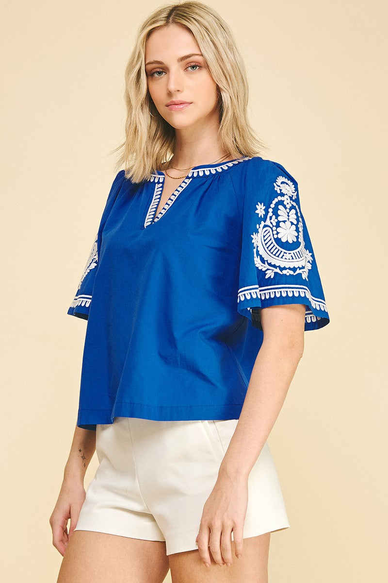 Ally Bohemian embroidered cotton blouse top in light blue with floral embroidery.