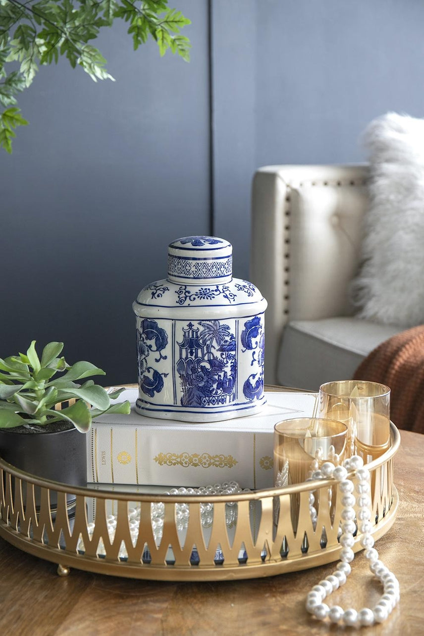 Oval porcelain jar in blue and white with a classic geometric pattern.