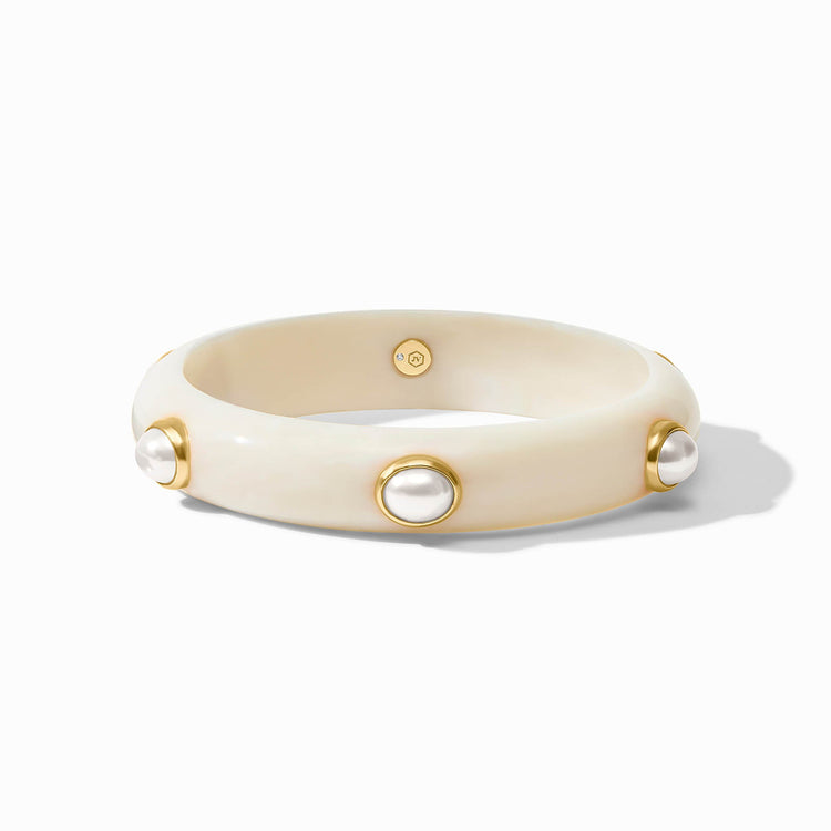 Sleek Carnaby Stone bangle in gold plate with acetate and imported glass accents.