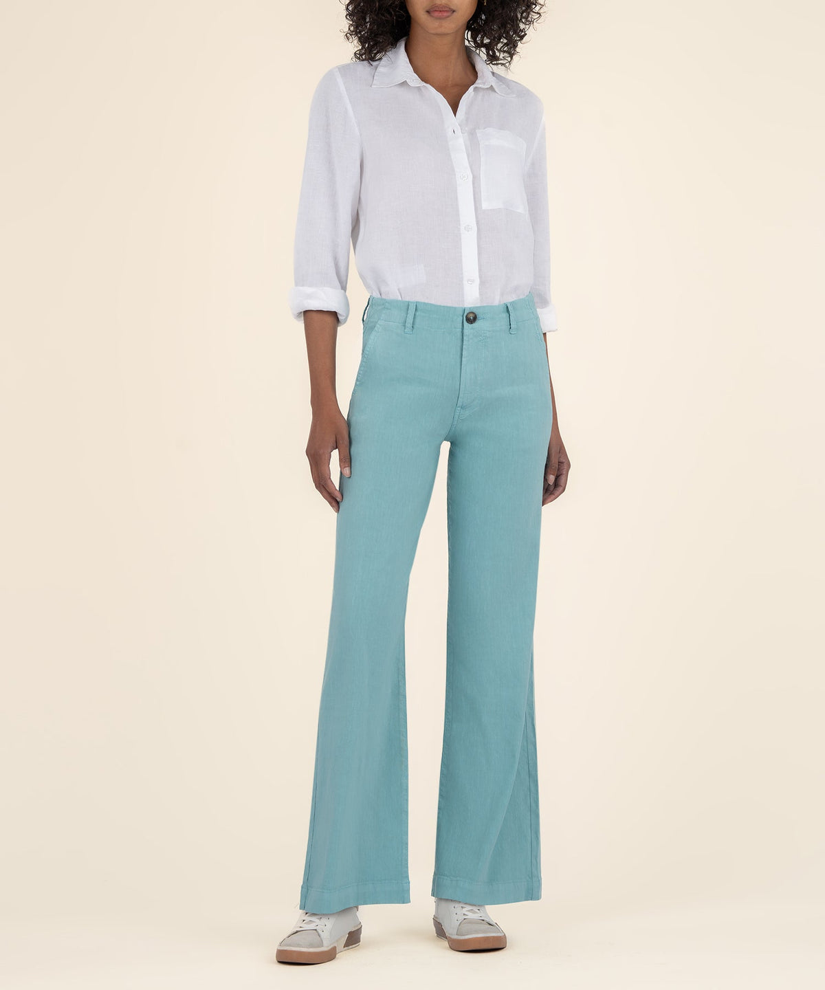 Front view of Meg Linen high-rise wide-leg pants in a neutral tone with soft fabric texture and relaxed silhouette.