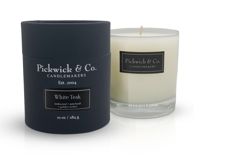 White teak wooden candle holder containing a small-batch Pickwick pillar candle.