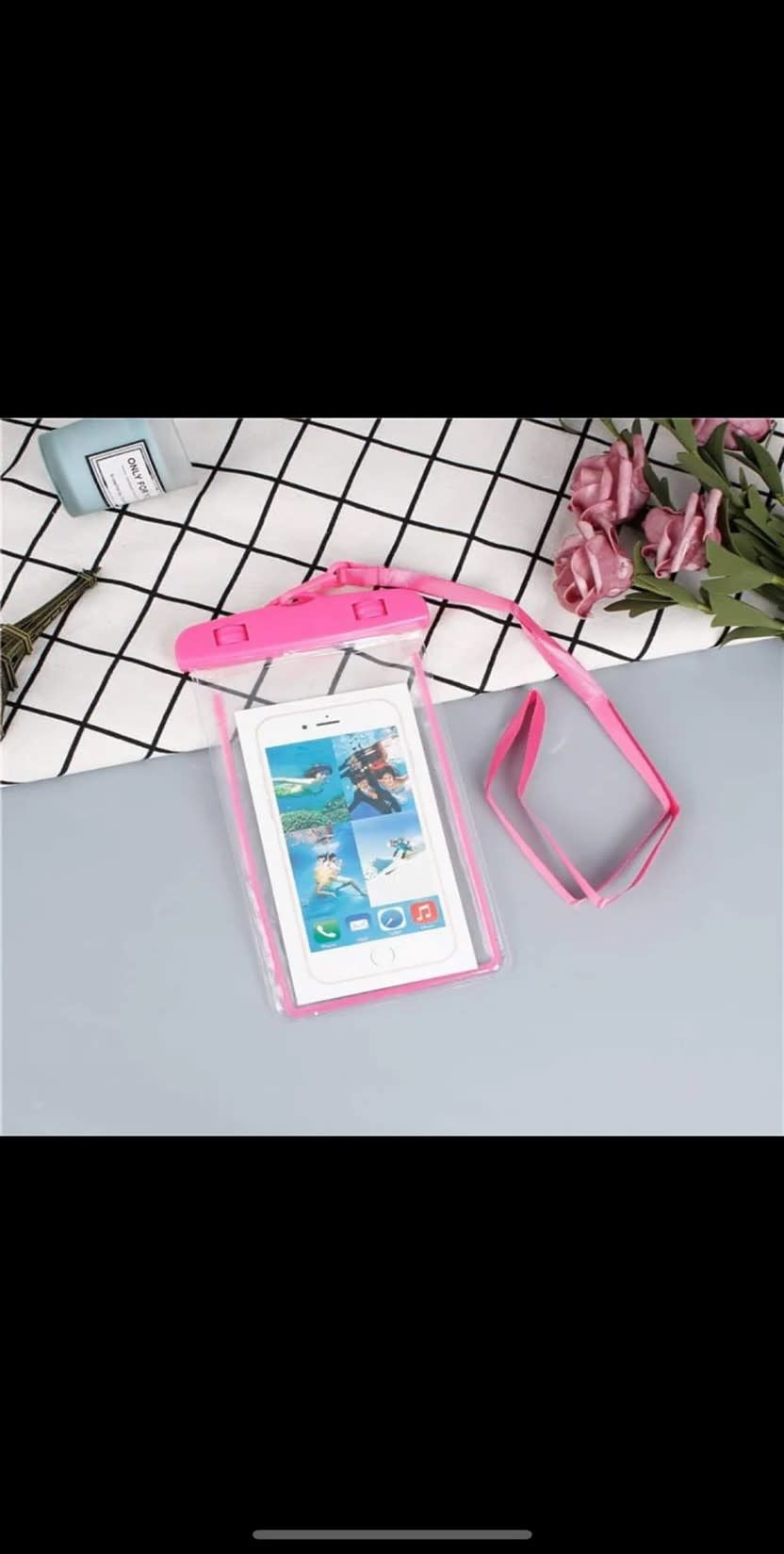 Transparent waterproof phone dry pouch with black zipper closure and attached neck lanyard.