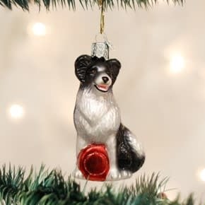 Blue ceramic Border Collie dog ornament with white collar detail.