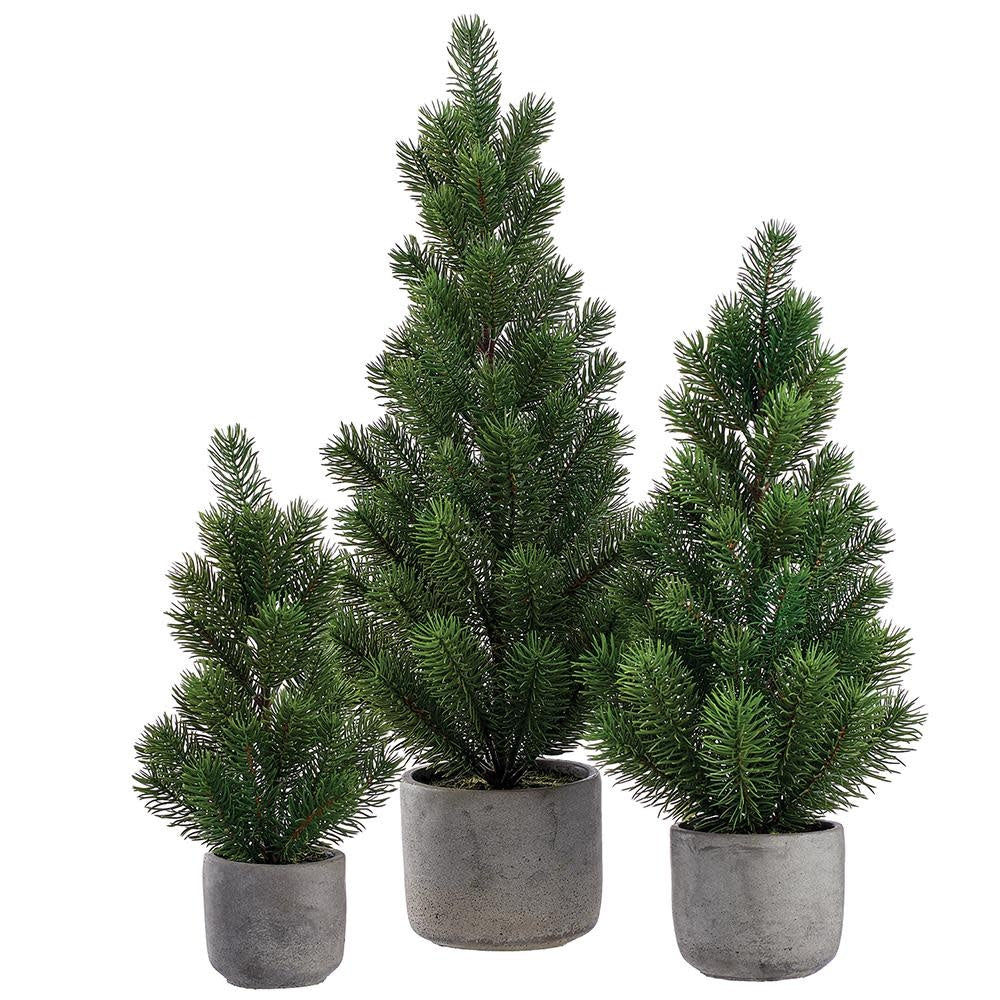 Green artificial pine tree in a cement pot with plastic foam materials.