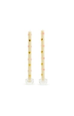 Two pink heart-shaped beeswax dinner candles in a set.