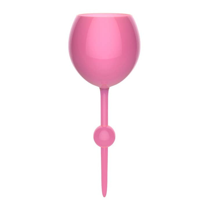 Pink sunset gradient beach glass tumbler with a curved handle.