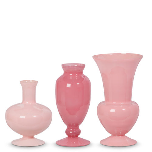 Pink glass vase with a cylindrical shape measuring six inches wide by eleven inches tall.