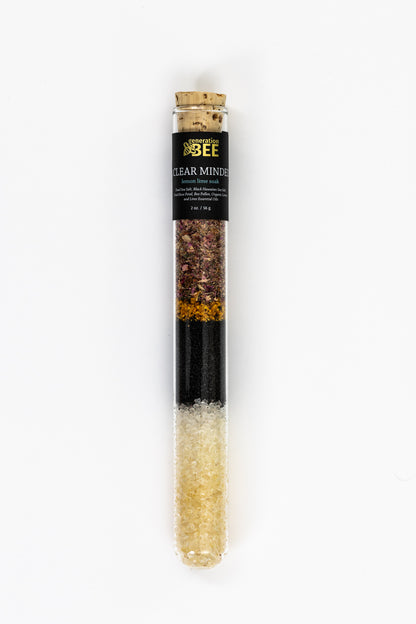 Generation Bee Clear Minded lemon lime soaking salt vial with layered colorful salts and botanicals.