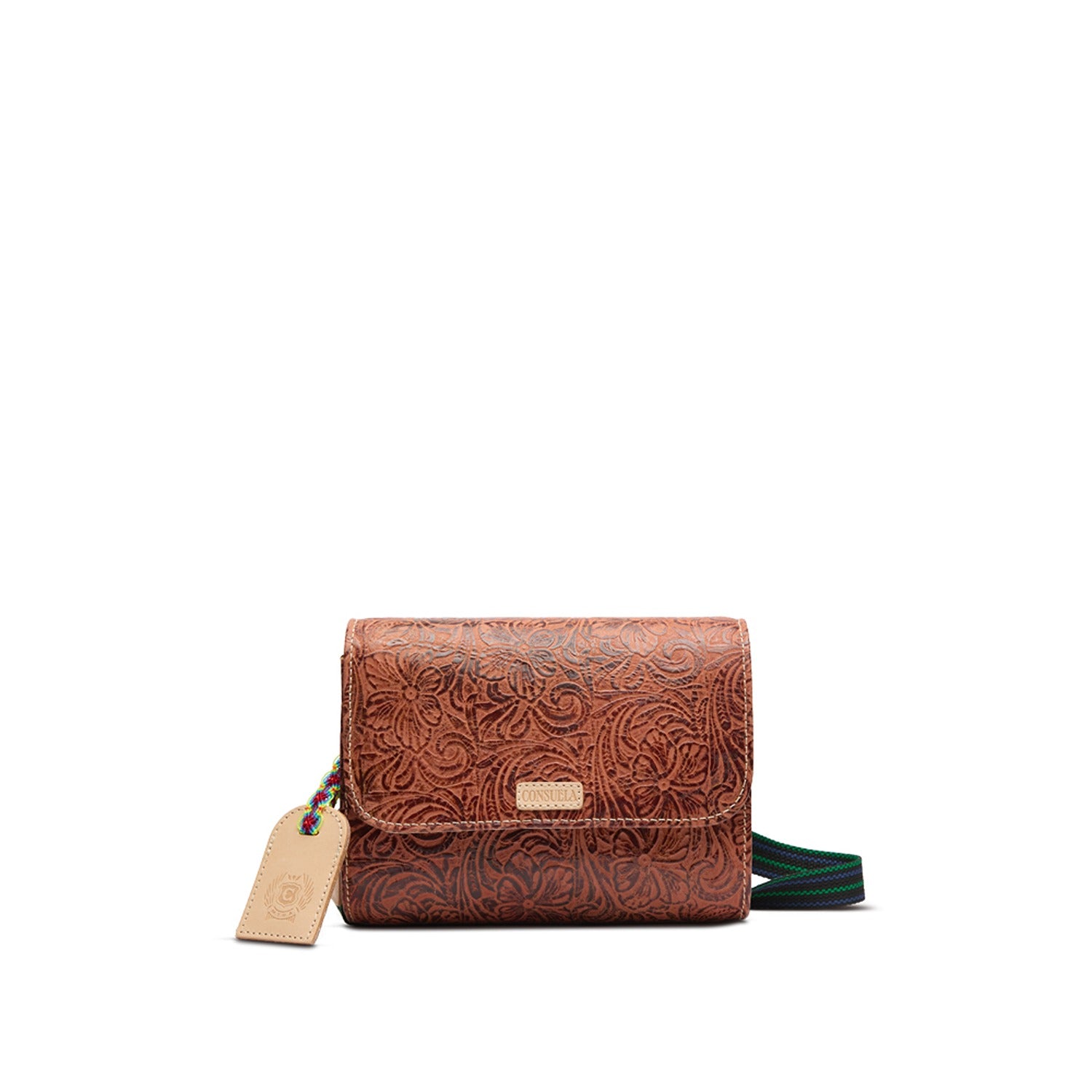 Sally On the Town brown tooled leather crossbody bag with a woven strap and logo tag.