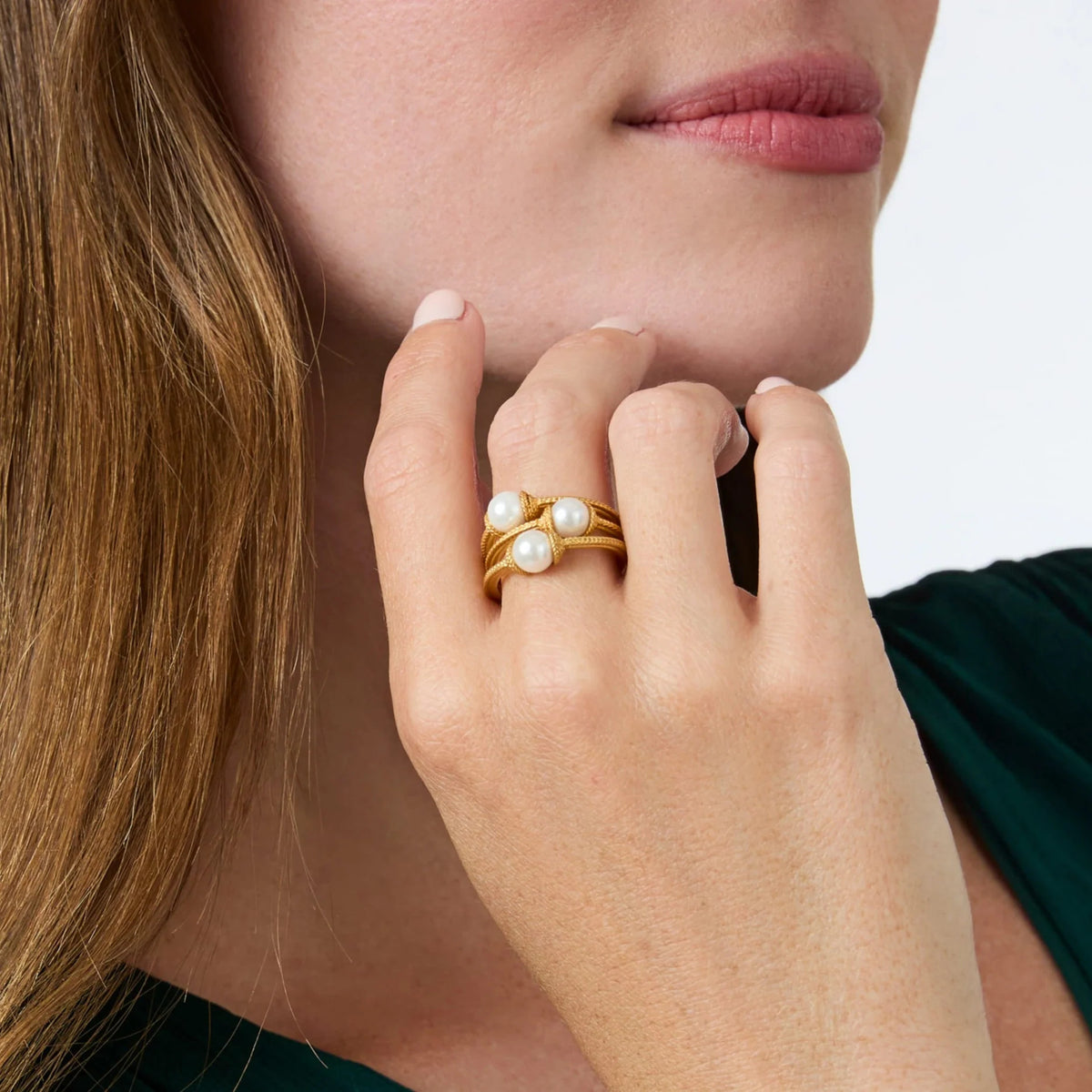 Calypso Trio Ring in gold-tone metal featuring three stacked bands with a sleek silhouette.