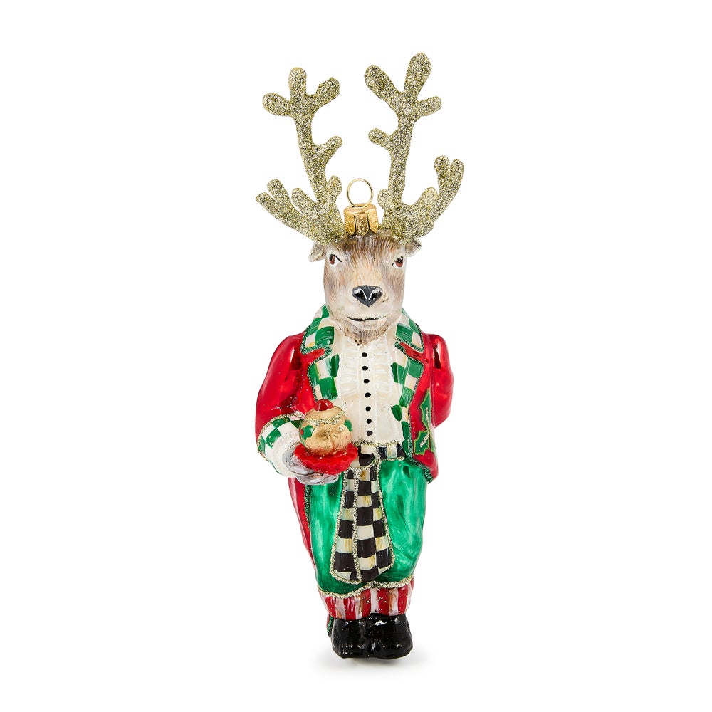 Check It Out Reindeer Butler glass ornament with glittery antlers and a red and green outfit.