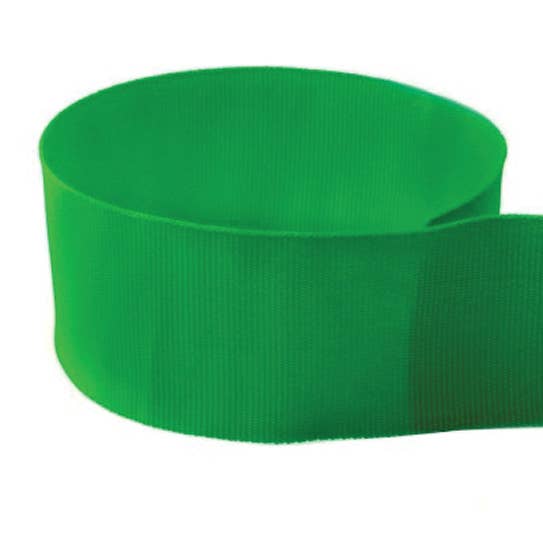 Spool of solid grosgrain ribbon in a neutral tone with a smooth texture.