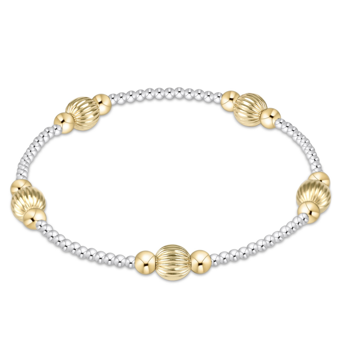 Purpose Dignity mixed metal bracelet featuring 6mm gold-filled fluted beads and silver accents.