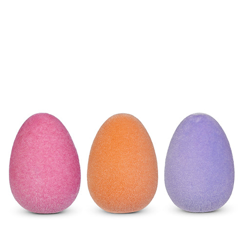 Eight-inch plastic egg with a sherbet flocked finish in pastel colors.