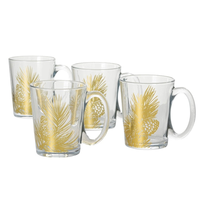 Set of four clear glass cappuccino mugs featuring a gold pine needle and pinecone design.