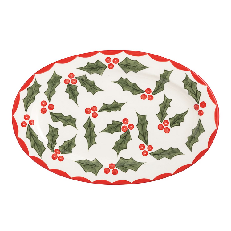 Oval white ceramic Holly Platter with hand-painted green holly leaves and red berries.