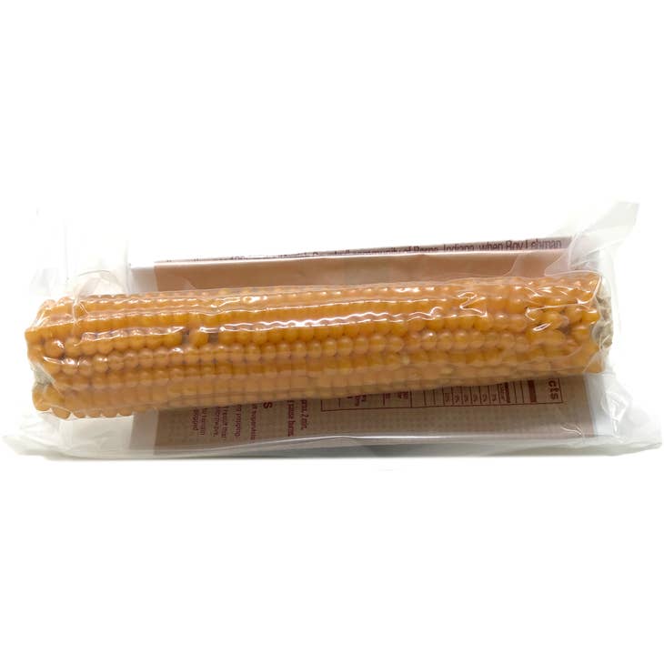 Yellow microwave popcorn cobs in a clear bag showing the product.