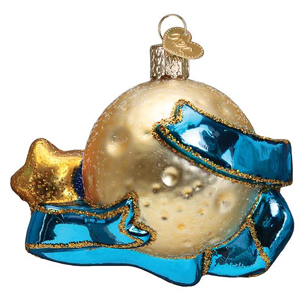Glass moon ornament with a blue banner and gold star, hand-painted with glitter accents.