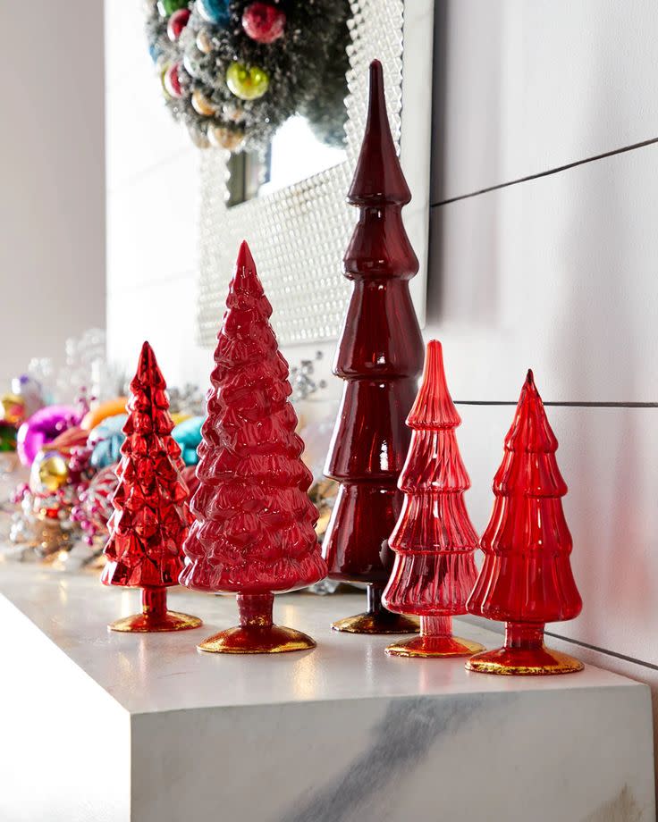 Clear glass Hue Tree candle holder with a natural tree branch silhouette.