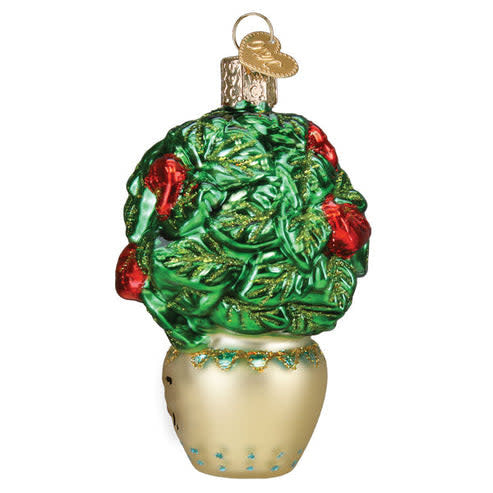 White ceramic Christmas ornament shaped like a potted succulent plant with green leaves.