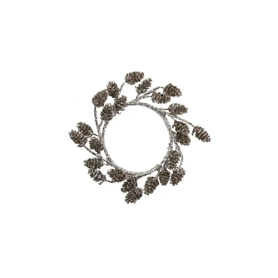 Platinum-finish plastic pinecone candle ring with detailed festive texture