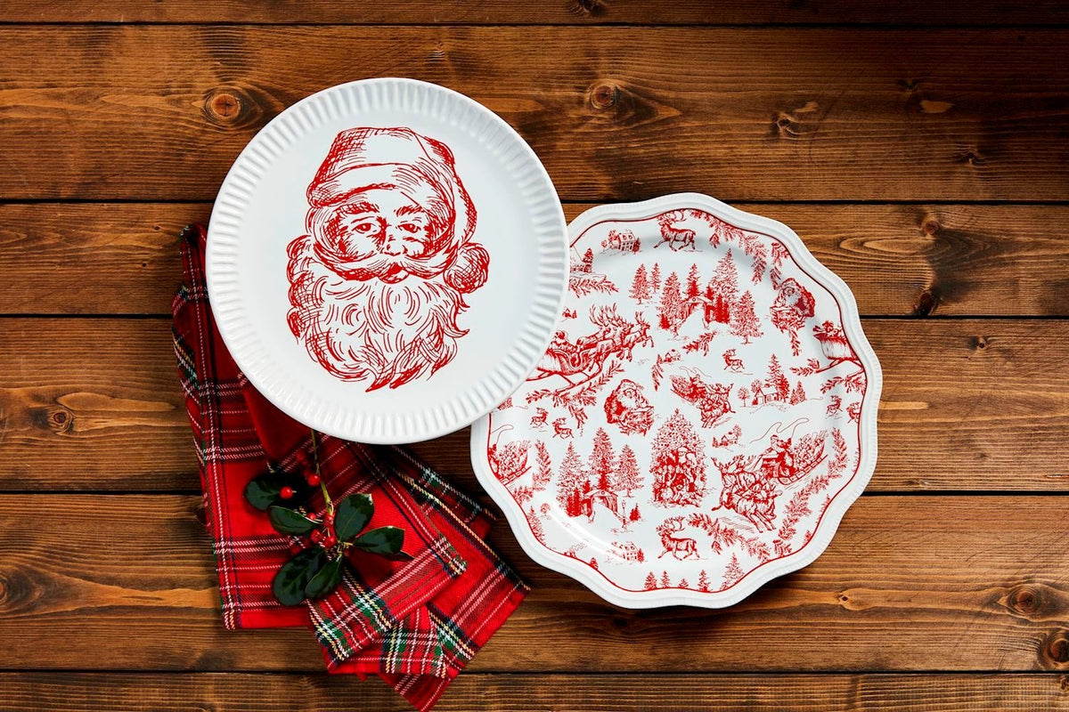 Small stoneware platter with a festive holiday-themed decorative pattern.