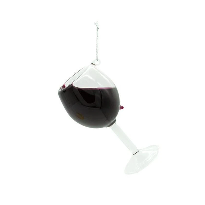 Glass Christmas ornament shaped like a tilted wine glass filled with red wine.