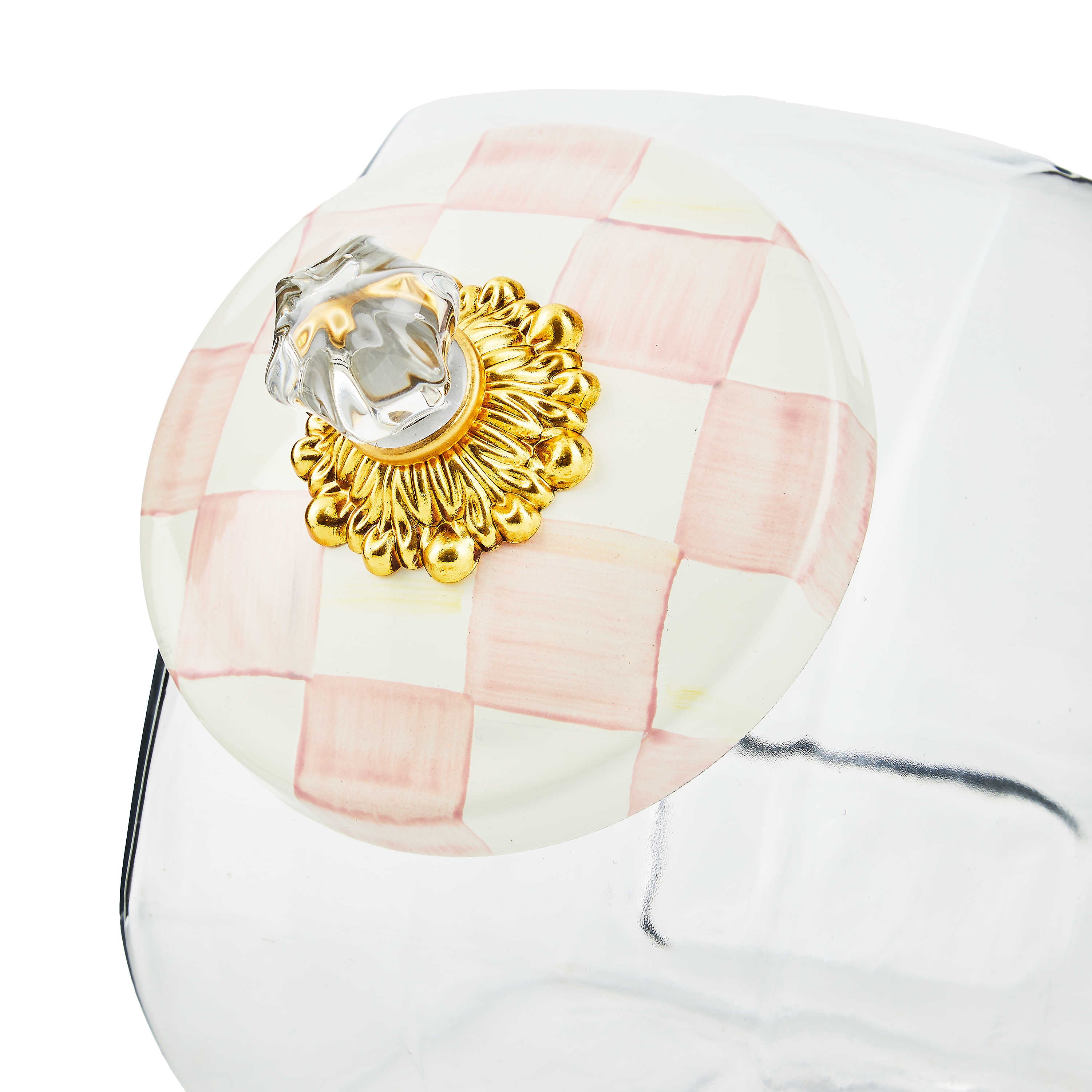 Glass cookie jar with rosy check enamel lid featuring hand-painted Sterling Checks pattern and brass hardware.