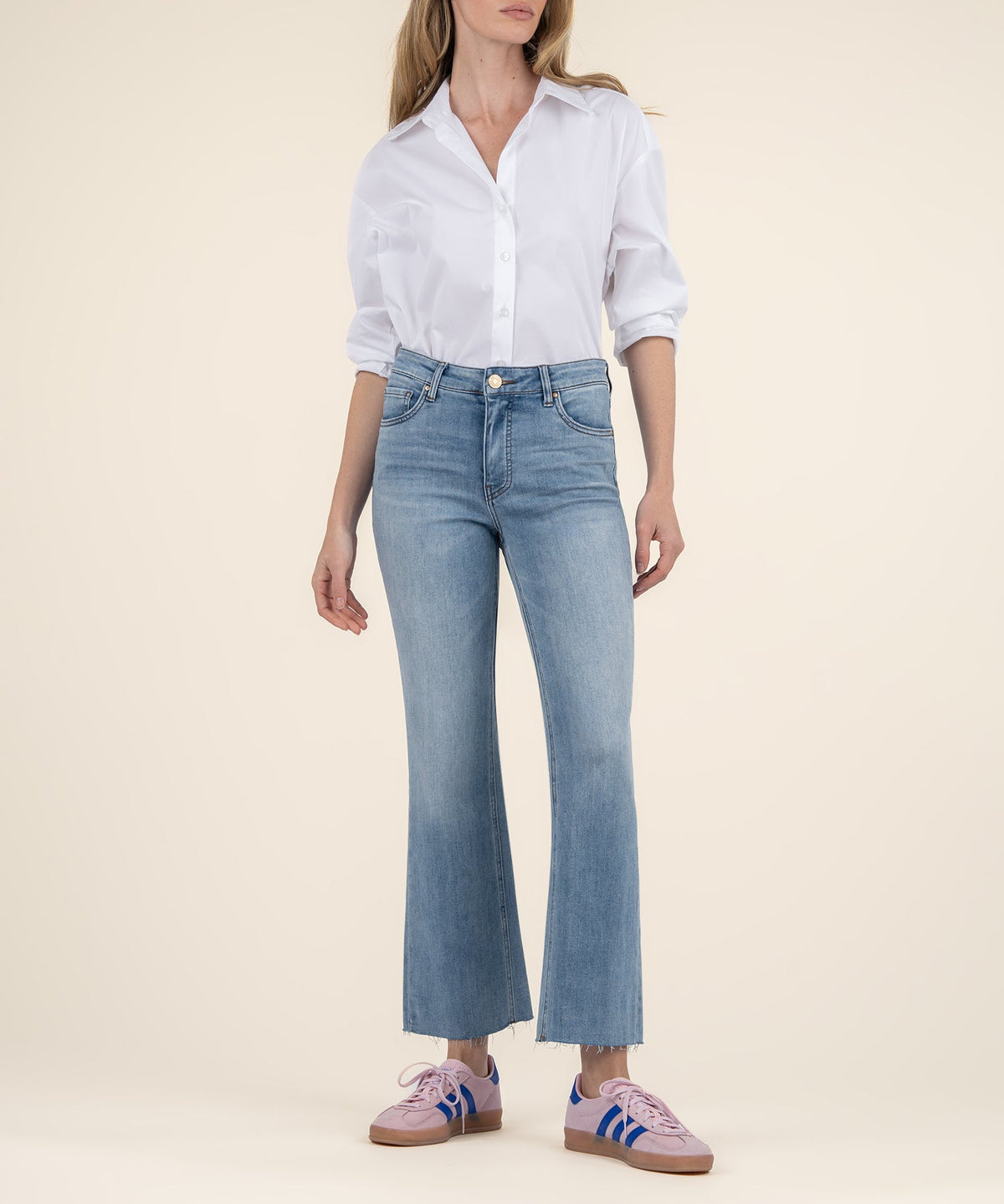 Kelsey high-rise flare jeans in dark wash denim with ankle opening