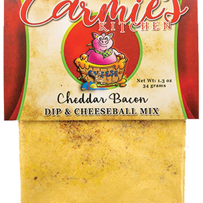 Cheddar Bacon Dip Mix packet with visible cheddar cheese and bacon pieces on a white background.