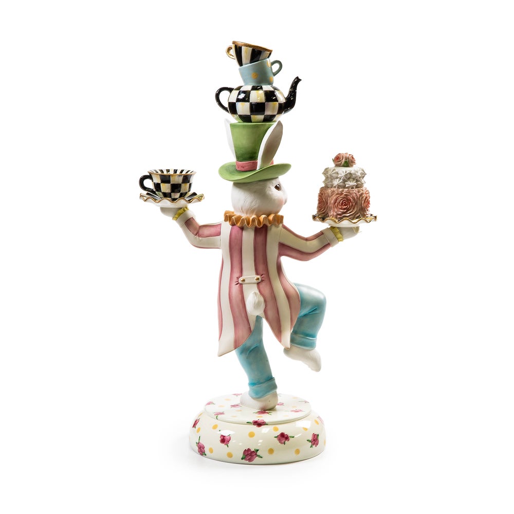 Rose Rabbit Centerpiece figurine featuring a white rabbit balancing tea sets and a floral cake.