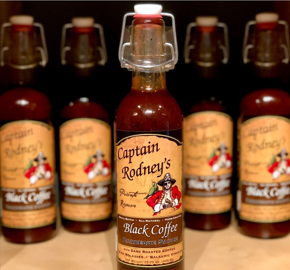 Captain Rodney's Black Coffee Barbeque Sauce in a swing-top bottle with a pirate label.