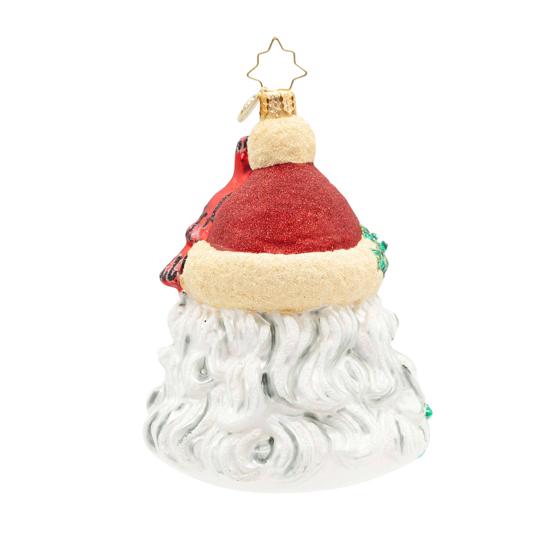 Back view of a Woodland Wishes Santa ornament with a red glitter hat and white flowing beard.